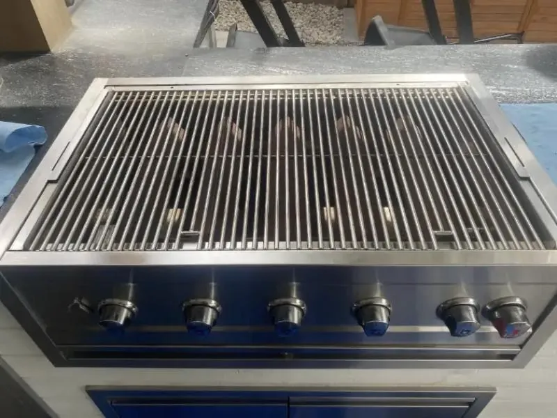 BBQ grates after a Grill Guardians deep clean: bright stainless